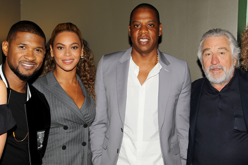 Jay Z and Beyoncé with some fans. Image via AP.
